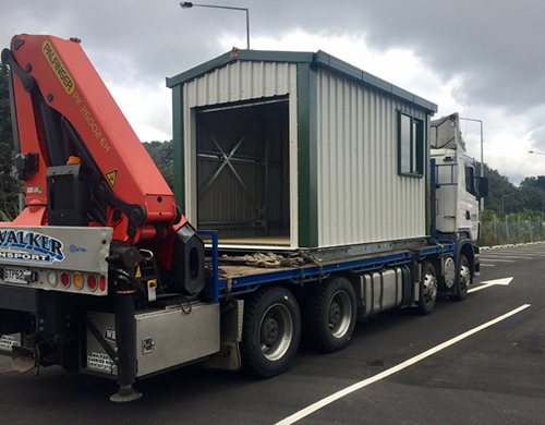 Shed Boss in Papakura, Auckland donated the shed, which was trucked to Fletcher Building headquarters for wrapping.