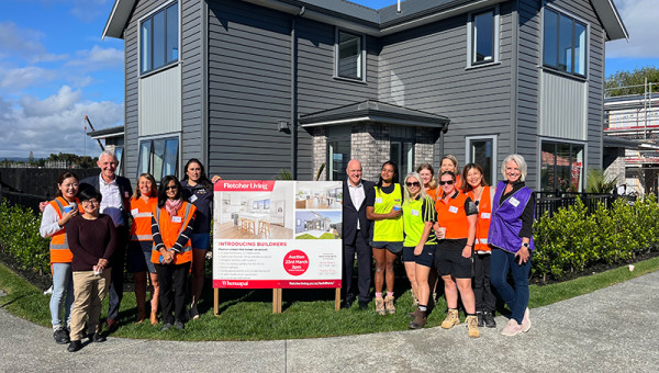 BUILDhers Crew with PM and Fletcher Building CEO Ross Taylor outside completed house